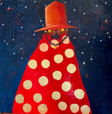 Whimsical painted figure wearing a red tall hat and red polka-dotted cape against a dark blue starry night sky background