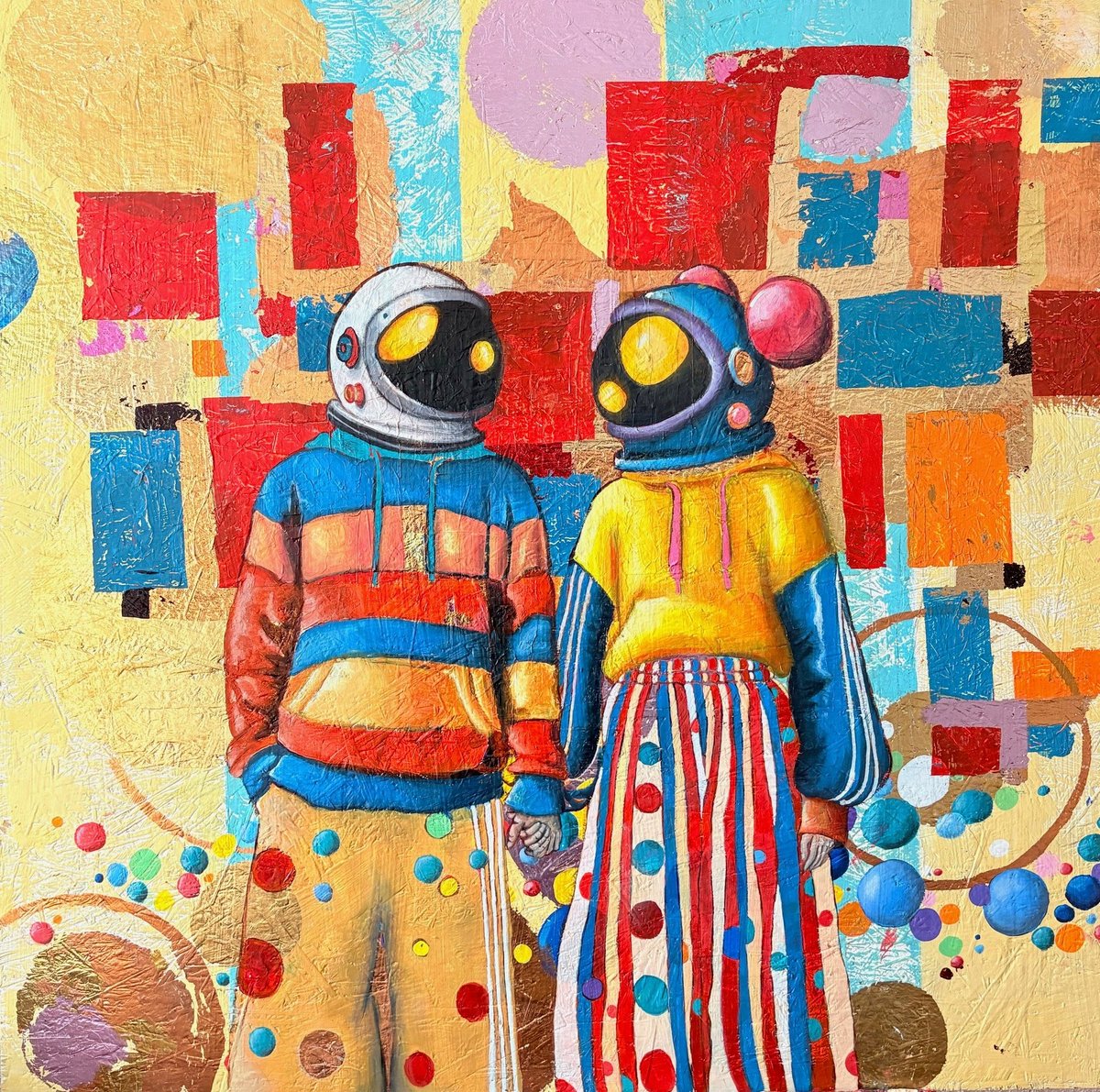 Two colorful robot figures wearing striped outfits standing against a vibrant abstract background with geometric shapes and floating spheres